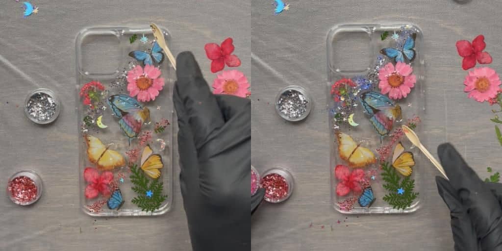 Glitter being dumped on a DIY resin phone case.