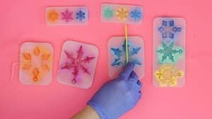 removing excess for resin snowflakes