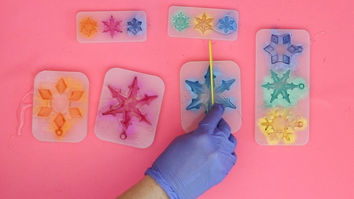 removing excess for resin snowflakes