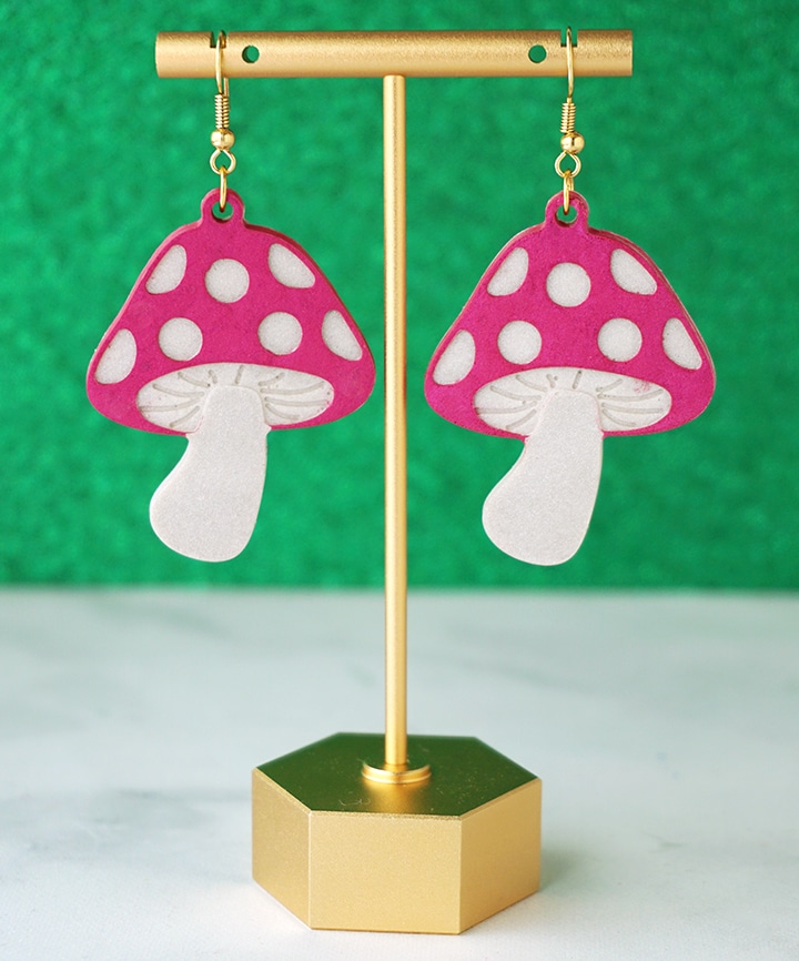 Resin Mushroom Earrings on display
