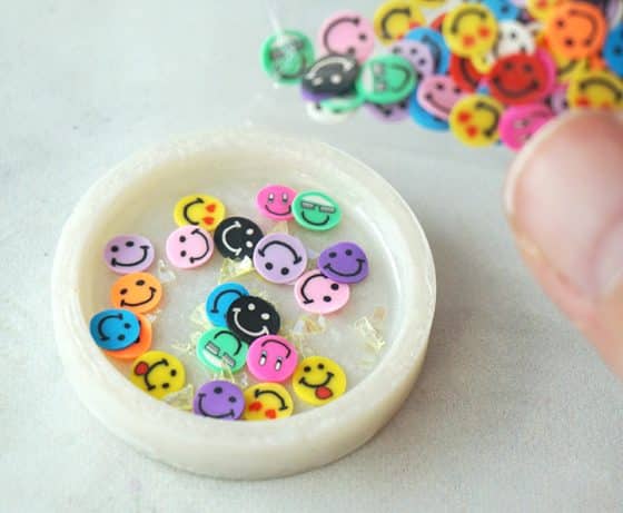 Happy Face polymer clay slices in resin shaker charm